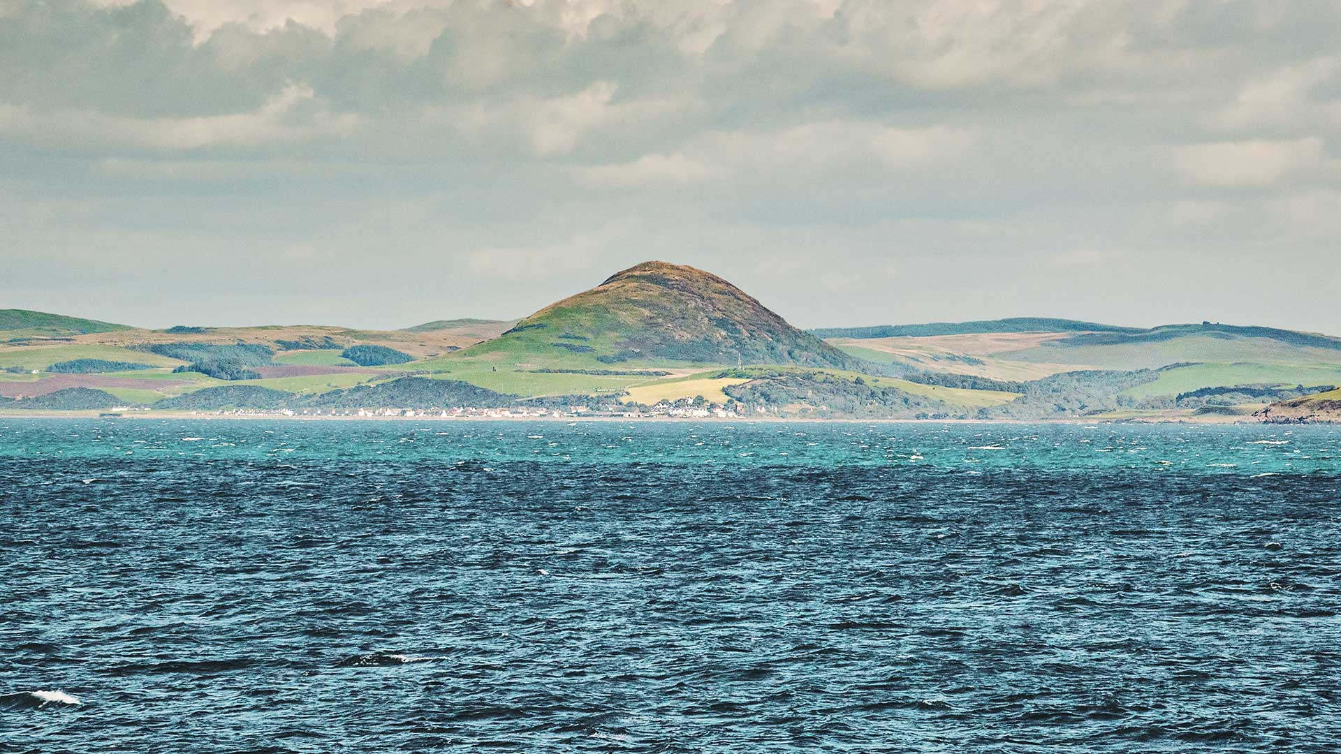 View of Ballantrae in the Lowland area of Scotland from the ocean.
