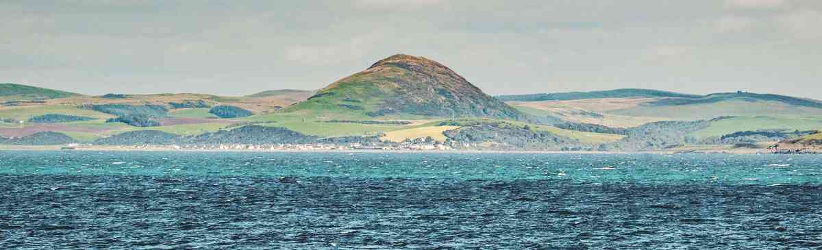 View of Ballantrae in the Lowland area of Scotland from the ocean.