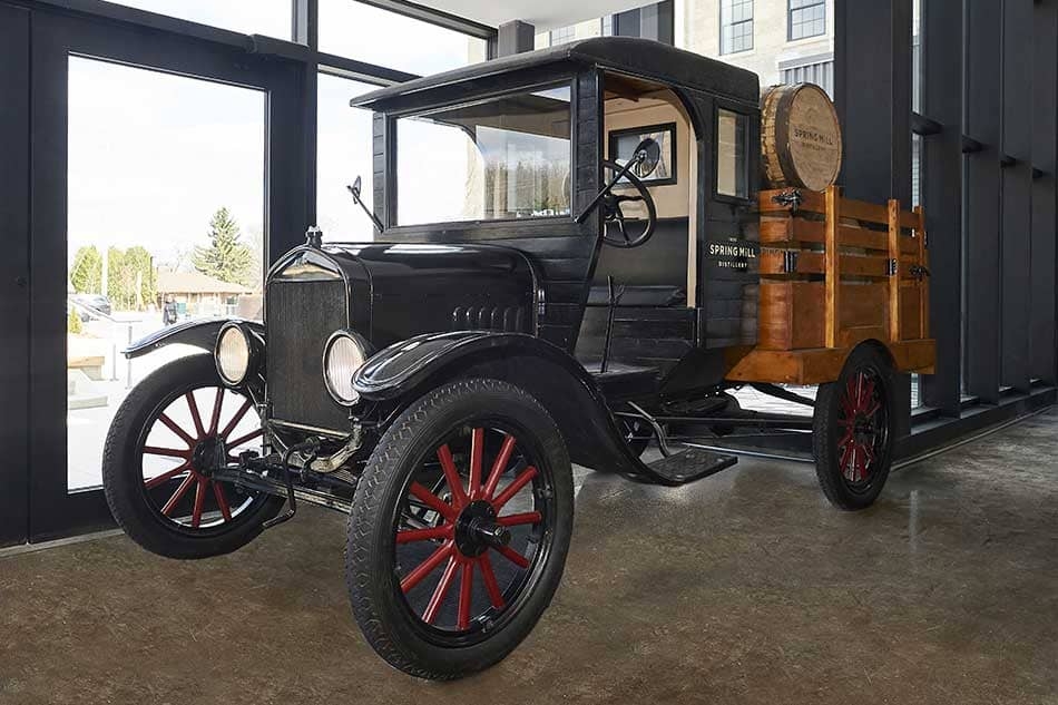 The old car inside Spring Mill Distillery.