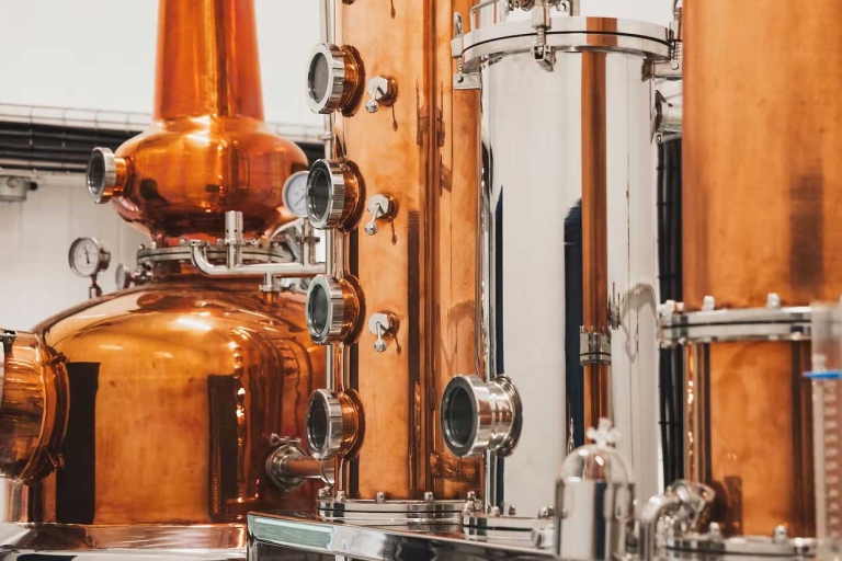 Copper stills at the Miellerie King Distillery.
