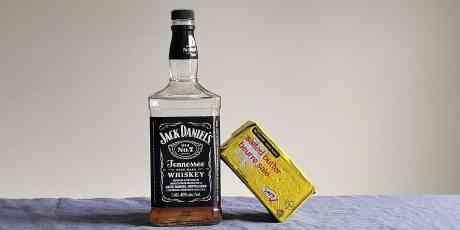 Bottle of Jack Daniel's Tennessee whiskey with butter.