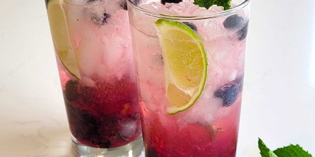 Blueberry mojitos made with fresh mint and blueberries.