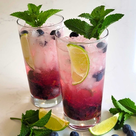 Blueberry mojitos made with fresh mint and blueberries.