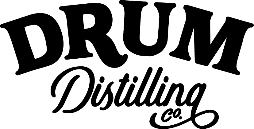 Drum Distilling Co. logo.